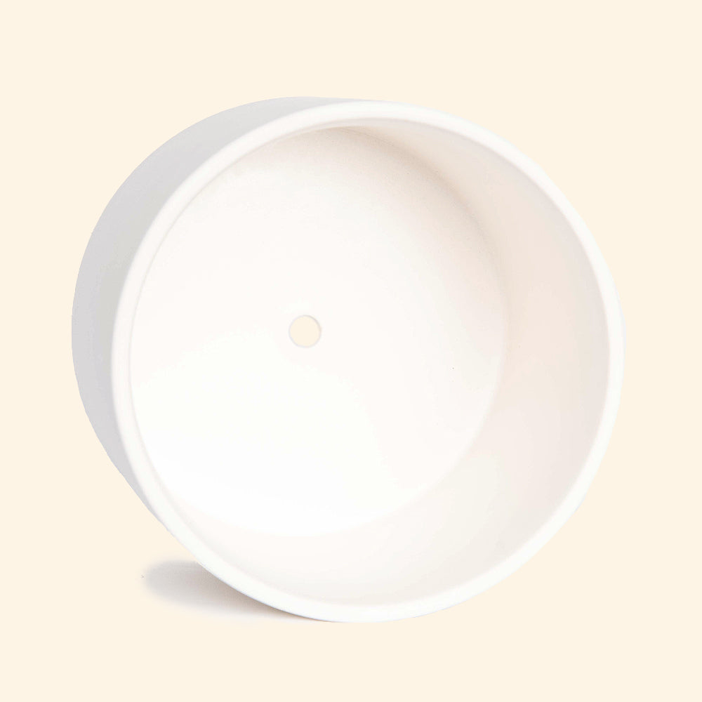 White pot with drainage for plants